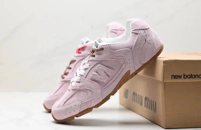 New Balance 574 Pink Suede Sneakers for Women